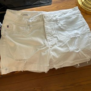 Cuffed destroyed white shorts